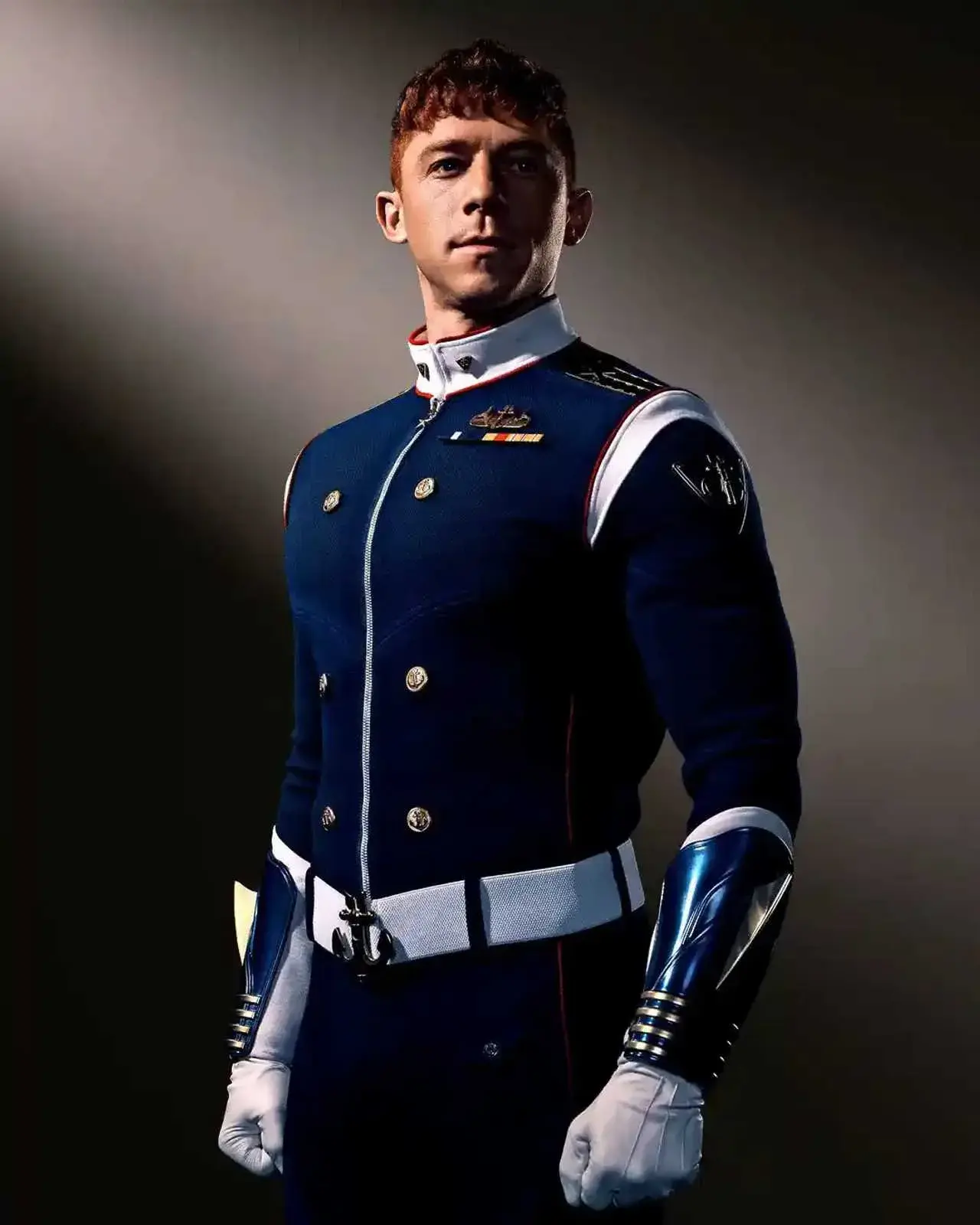 Vought Rising character poster: Will Hochman in a navy dress uniform with white gloves